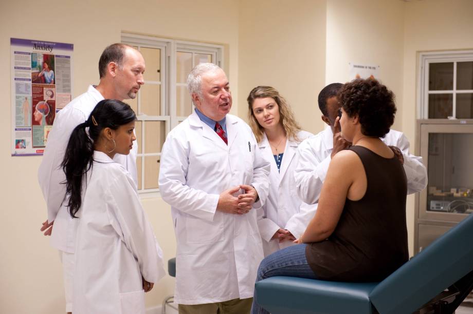 MUA - Group of Doctors Evaluating the Patient